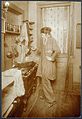 Allison at her kitchen stove, dying scarves, ca. 1912-1920. (9564209184).jpg