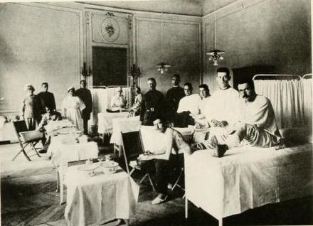 Nurses, personnel, and patients of United States Base Hospital 32 in Contrexeville, France in 1918.
