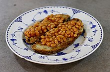 Baked beans on sourdough toast, served in a cafe in London, England Beans on sourdough toast.jpg