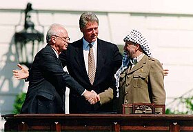 Yitzhak Rabin, Bill Clinton, and Yasser Arafat at the Oslo Accords signing ceremony, 13 September 1993 Bill Clinton, Yitzhak Rabin, Yasser Arafat at the White House 1993-09-13.jpg
