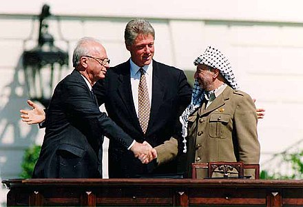 Palestine_from_the_river_to_the_sea 440px-Bill_Clinton,_Yitzhak_Rabin,_Yasser_Arafat_at_the_White_House_1993-09-13