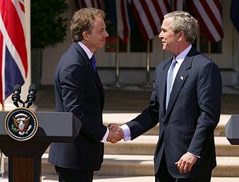 Tony Blair and then-U.S. President George W. B...
