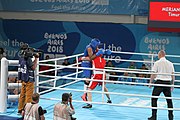 Deutsch: Boxen bei den Olympischen Jugendspielen 2018 Tag 12, 18. Oktober 2018 - Kampf um die Bronzemedaille im Fliegengewicht Mädchen – Timur Merjanow (Usbekistan, rot) schlägt Youssef Ali Karar Ali (Ägypten, blau) 5-0; Ringrichter ist Antonín Gaspar (Tschechien). English: Boxing at the 2018 Summer Youth Olympics on 18 October 2018 – Boy's heavyweight Bronze Medal Bout - Timur Merjanov (Uzbekistan, red) beats Youssef Ali Karar Ali (Egypt, blue) 5-0; Referee is Antonín Gaspar (Czech Republic). Español: Boxeo en los Juegos Olímpicos Juveniles de Verano de 2018 en 18 de octubre de 2018 - Medalla de bronce de peso pesado del muchacho: Timur Merjanov (Uzbekistán, roja) le gana a Youssef Ali Karar Ali (Egipto, azul) 5-0; El árbitro es Antonín Gaspar (Republica checa).