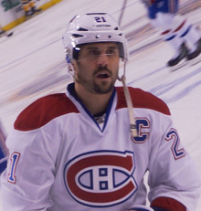 Gionta in 2014 as captain of the Montreal Canadiens BrianJGionta2014.png