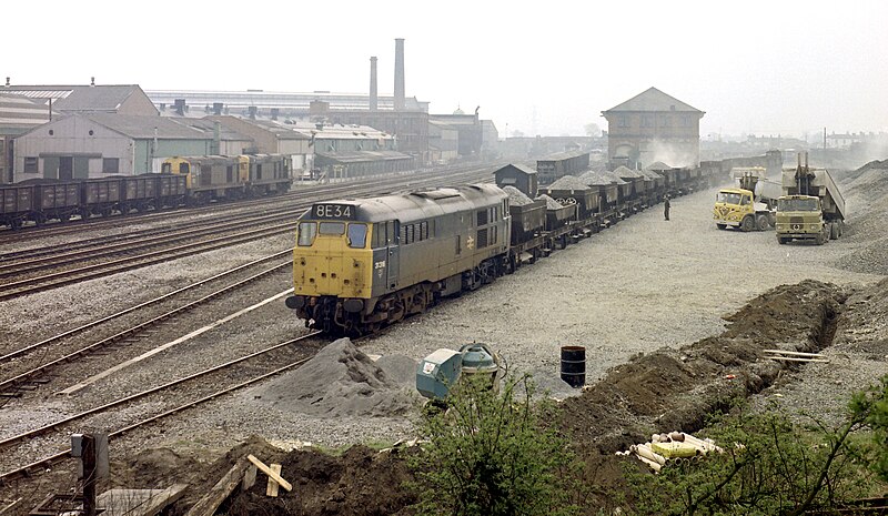 File:Brush type-2 no. 31316 with a train being loaded with ballast, Nigel Tout, 25.4.75.jpg