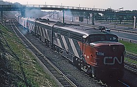 CN FPA4 6764 with Train 49, the Tecumseh at Sunnyside Station, Toronto, July 2, 1966. Note the A-B-A arrangement of locomotives.