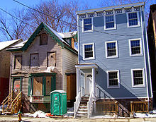 These homes on Chambers Street show the two faces of contemporary Newburgh: both historic, one newly renovated, the other exemplifying urban blight