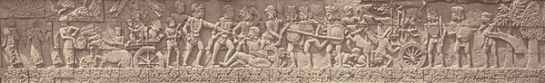 Battle scene from the main temple of Penataran temple complex, 1269 saka or 1347 AD. Close-up of KITLV 87823 - Isidore van Kinsbergen - Reliefs on Tjandi Panataran near Blitar - Before 1900.jpg