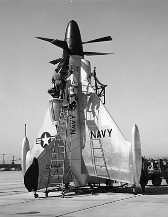 The XFY-1's pilot entering the aircraft via a ladder