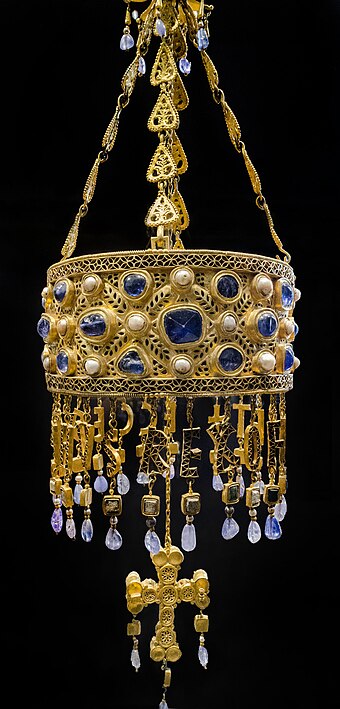 Detail of the votive crown of Recceswinth from the Treasure of Guarrazar, (Toledo-Spain) hanging in Madrid. The hanging letters spell [R]ECCESVINTHVS REX OFFERET [King R. offers this].[a]