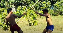 The long staff(dambong veng) and short staff(s)(dambong clei) are common weapons in Bokator and Cambodian martial arts Dambong2020.jpg