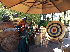 Disneyland Merida shoots her bow.jpg