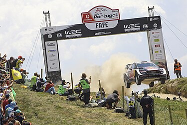 The Ford Fiesta WRC of Elfyn Evans and Daniel Barritt jumping at the Rally de Portugal's iconic Fafe stage. Domingo 20, Rally de Portugal 2018 - 3.jpg