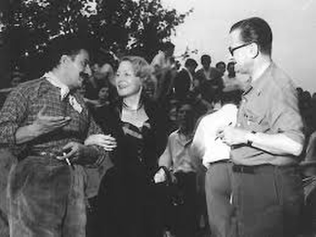 Julien Duvivier, on the right, with Italian writer Giovannino Guareschi, 1952