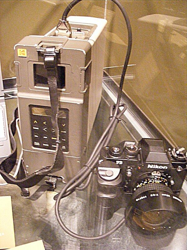 Kodak DCS 100, based on a Nikon F3 body with Digital Storage Unit, released in May 1991