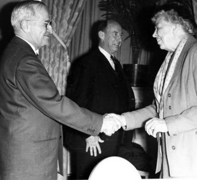 Former President Truman (left) greets Eleanor Roosevelt (right) at the convention as Adlai Stevenson (center) looks on