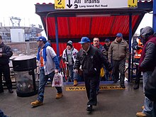 Fans ascending from the platform to the walkway to Citi Field, during the Mets' 2014 Home Opener game.