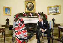 Halima Bashir with George Bush.jpg