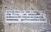 A 12th-century[46] Medieval Latin inscription in Italy featuring sans-serif capitals