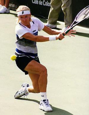 Novotná hitting a slice backhand