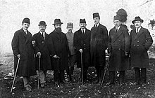 Albanian cabinet in January 1922. The individuals in the photograph from left to right are: Mehmet Konica, Albanian delegate to the League of Nations; Spiro J. Koleka, Minister of Public Works; Fan S. Noli, Minister of Foreign Affairs; Ismail H. Tatzati, Minister of War; Xhafer Ypi, Prime Minister; Ahmed Zogu, Minister of the Interior; Hysen Vrioni, Minister of Justice; Kole Thaci, Minister of Finance. Courtesy of the General Directorate of the Albanian Archives, Tirana, Albania. Kabineti Ypi (1921).jpg