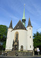 Barevná fotografie gotického kostela Nejsvětější Trojice v Žitavě