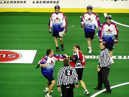 A fight during a lacrosse game between two players on the Toronto Rock and Calgary Roughnecks