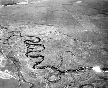 The Laramie River meanders across its floodplain in Albany County, Wyoming, 1949