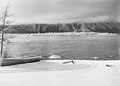 Looking across bay to ice floe with pointed seracs in front of foggy mountain, near Atlin, British Columbia, December 6, 1917 (AL+CA 3324).jpg