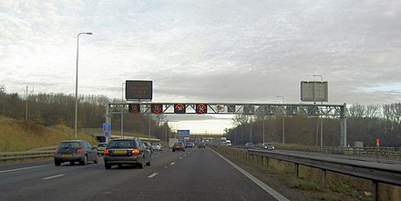 The M42, with lowered speed limits and hard-shoulder running, as seen on the matrix Variable Message Sign (VMS) on the left.