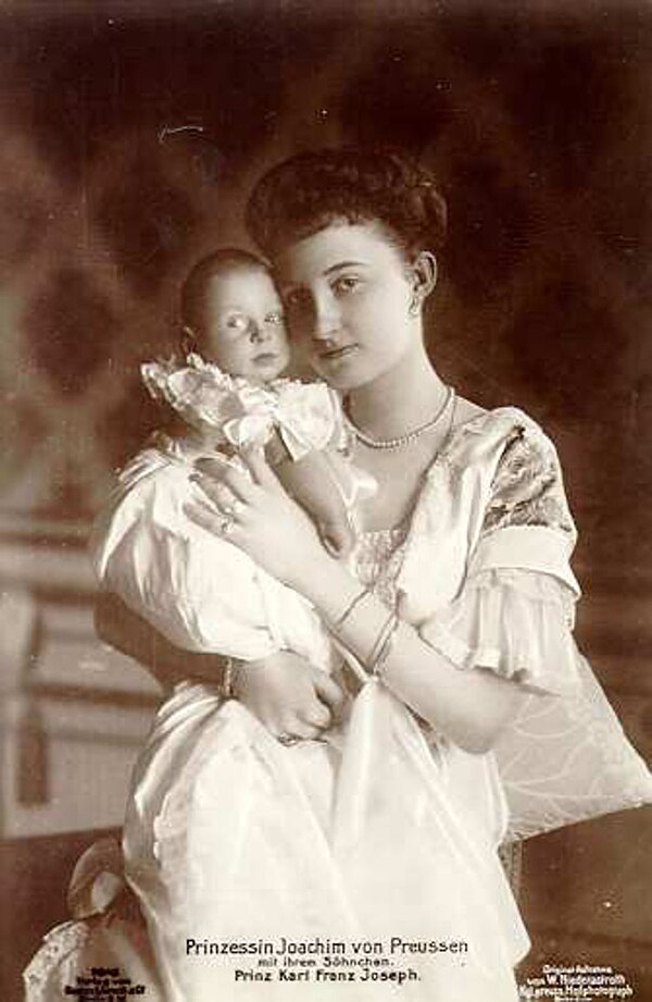 Marie-Auguste with her son.