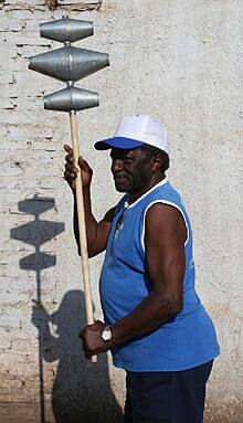 Afro-Argentine man in Merlo with a masacalla, used for Argentine candombe Masacalla actual.jpg