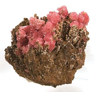 Miguelromeroite Pale pink mineral - synthetic compound