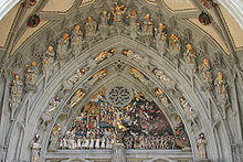 Statues representing the Last Judgement, over the main portal of the Munster of Bern Muensterportal01.jpg