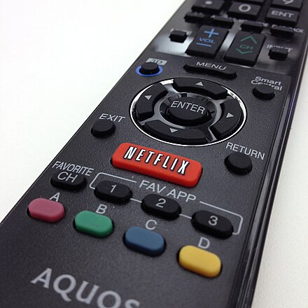 A Sharp Aquos remote control with a Netflix button