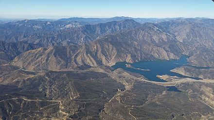 Pyramid Lake seen from the air with the Pacific Ocean in the distance.