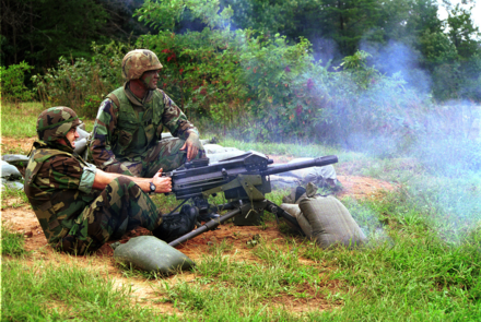 A U.S. Marine fires a Mk 19 40 mm grenade launcher in Quantico, Virginia in September 2000.