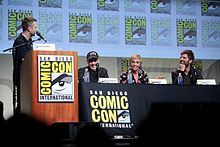 (L-R) Moderator Chris Hardwick, director Michael Dougherty, and cast members Toni Collette and Adam Scott at the 2015 San Diego Comic-Con to promote the film. SDCC 2015 - Michael Dougherty, Toni Collette & Adam Scott (19546302729).jpg