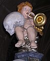 Putto with trumpet and skull, Sedlec Ossuary, Czech Republic.