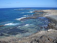 Reefs on the deserted coastline of the Savage Islands Selvagem Pequena - 1ago04.jpg