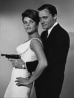 Robert Vaughn with his modified P-38 (1964) Senta Berger Robert Vaughn Man From Uncle 1964.JPG