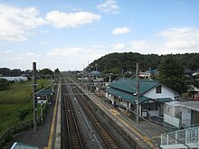 View of Shimōsa-Manzaki Station side platforms from the footbridge