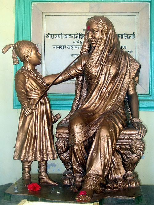 A statue of Jijabai and young Shivaji Raje on Shivneri fort.