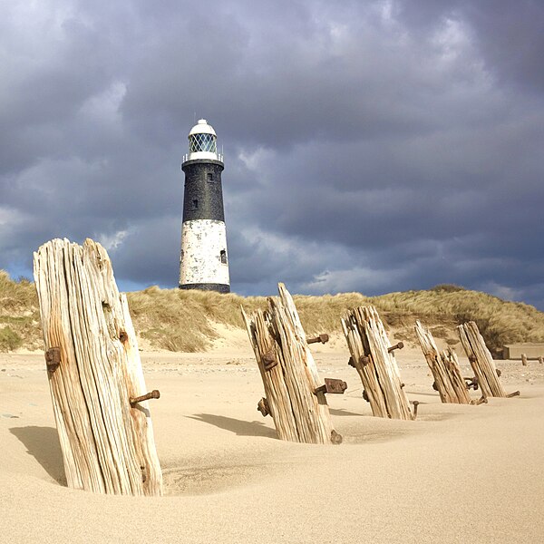 File:Spurn Lighthouse with worn groynes in foreground - geograph.org.uk - 2633227.jpg