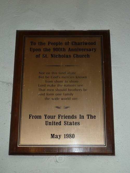 The fourth Hickson verse (with "o'er" misspelled as "o're") on a British-American friendship plaque in St Nicholas' Church, Charlwood, Surrey.