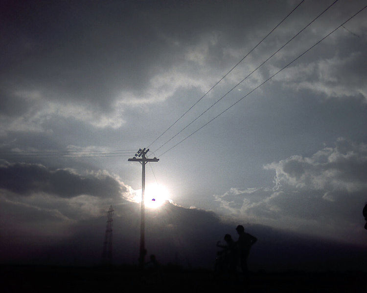 File:Stormy Weather in Village.jpg