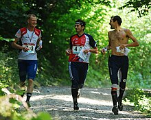 Nordberg, Smola, and Gueorgiou finishing the race after aiding Johansson; Gueorgiou has the stick in his pocket. Team Fairplay.jpg