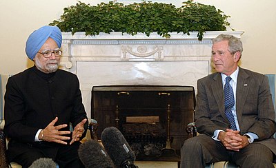 The Prime Minister, Dr. Manmohan Singh with the American President, Mr. George W. Bush interacting with media at oval office, in Washington DC