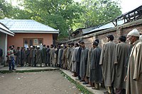 The voters standing in a queue for their turn to cast votes at a polling booth of Budgam, Srinagar in Jammu & Kashmir during the 4th Phase of General Election-2009 on May 07, 2009.jpg