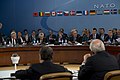 U.S. Secretary of Defense Chuck Hagel, left, listens as NATO Secretary General Anders Fogh Rasmussen, at microphone second from right, makes an opening statement during a North Atlantic Council meeting at NATO 130604-D-BW835-240.jpg